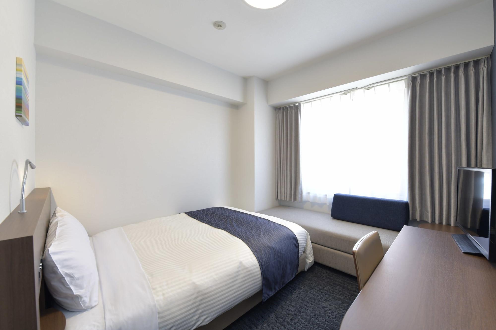 Hotel Port Plaza Chiba Exterior photo A typical room at a capsule hotel